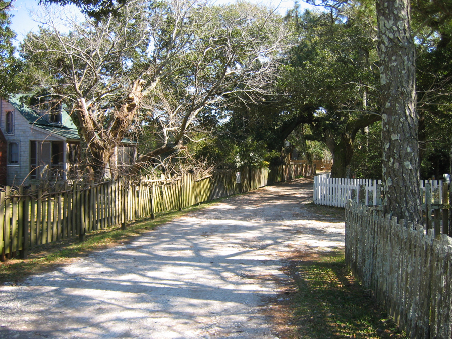 Howard Street in Ocracoke. Many residents of Ocracoke claim Blackbeards purser, William Howard as their ancestor. Pirate lingo as well as other forms of pre-Colonial English are part of the Ocracoke brogue. Photo Federal Highway Administration.