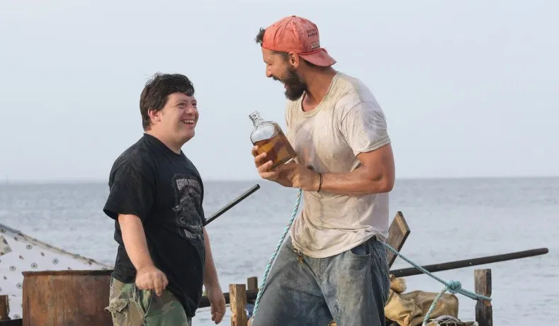 Zack Gottsagen and Shia LaBeouf in The Peanut Butter Falcon. Image Roadside Attractions.